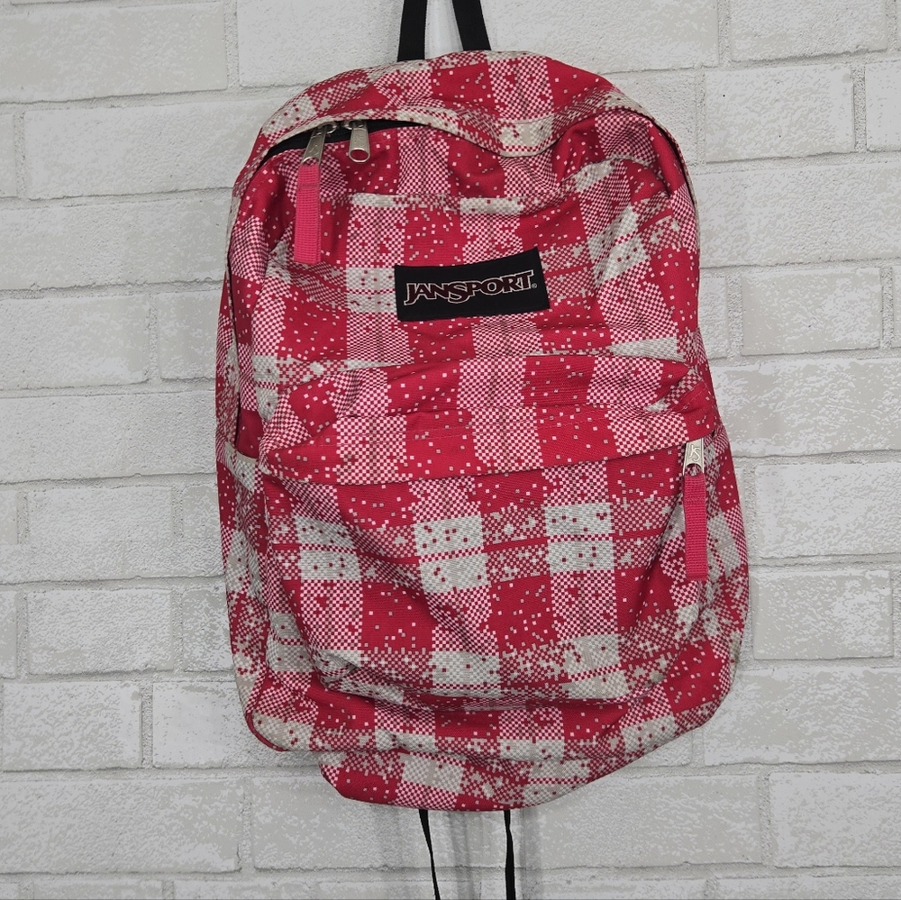 Jansport *like new* pink tulip digi plaid backpack